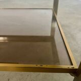 Coffee table in brass and smoked glass designed by Guy Lefèvre for the Jansen house, 1970s/80s
