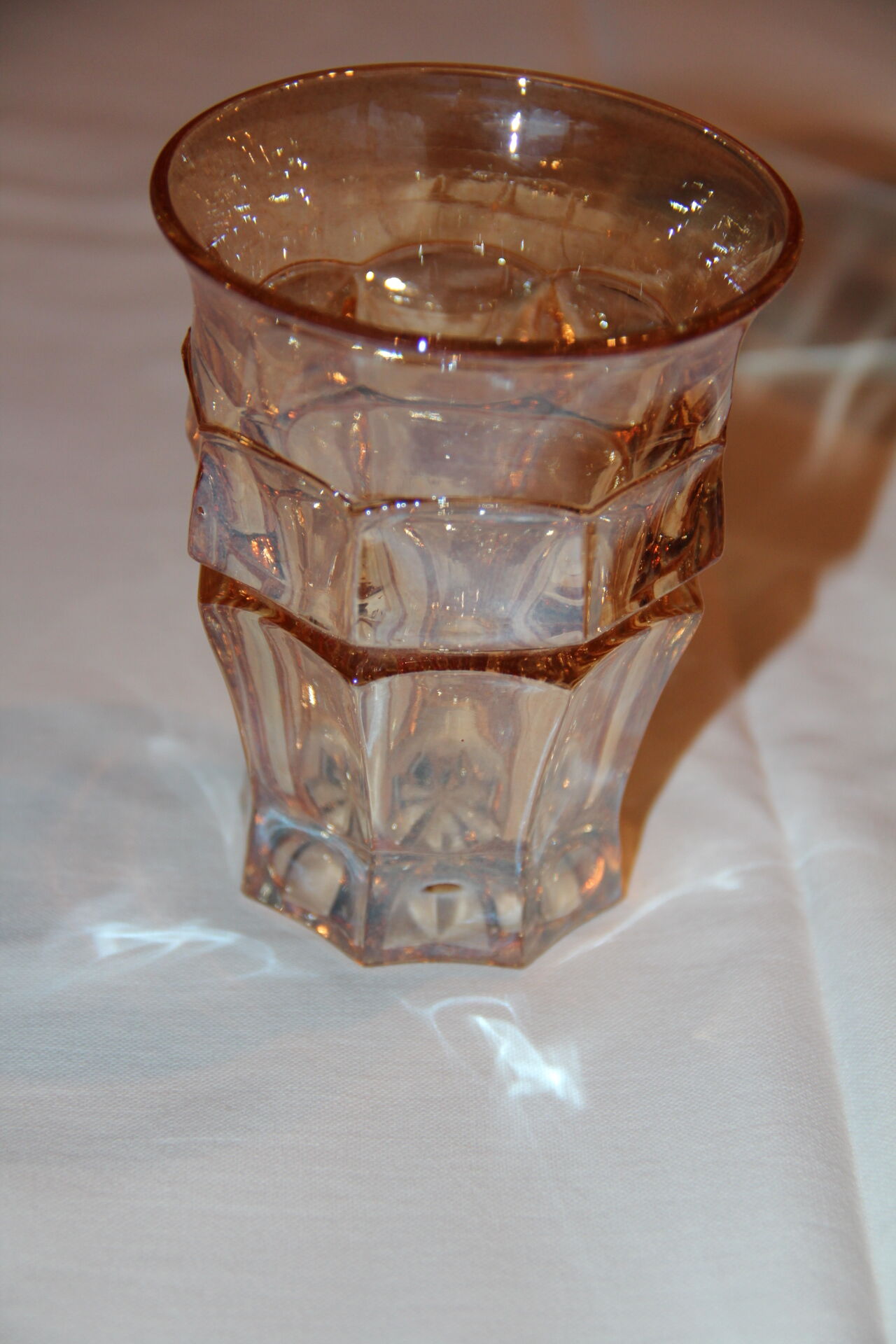 Pourer and her four orange-pink glasses