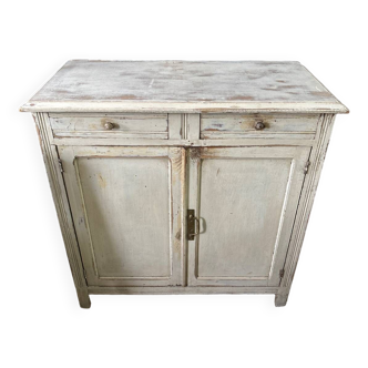 White patinated sideboard