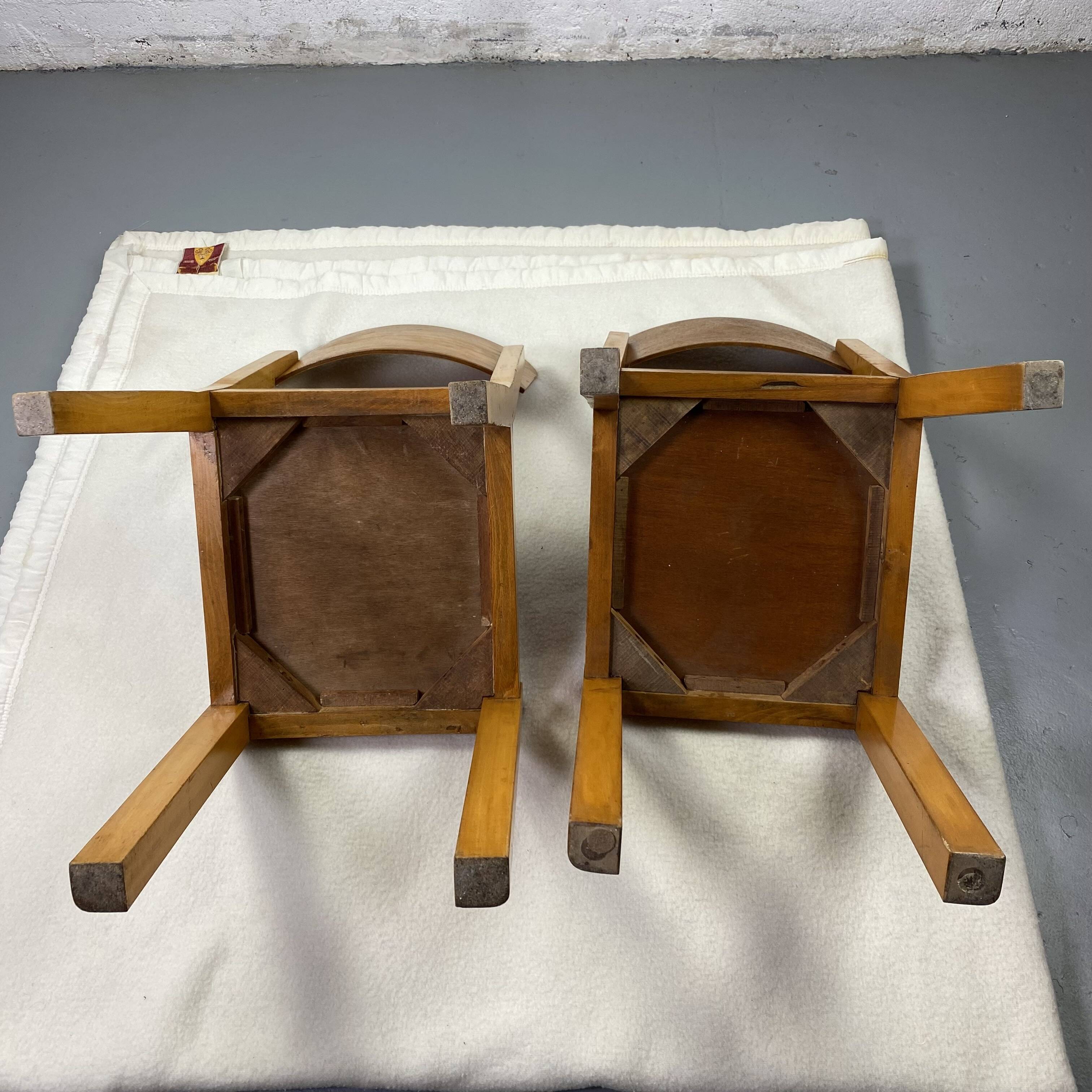 Pair of wooden and leather chairs