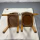 Pair of wooden and leather chairs