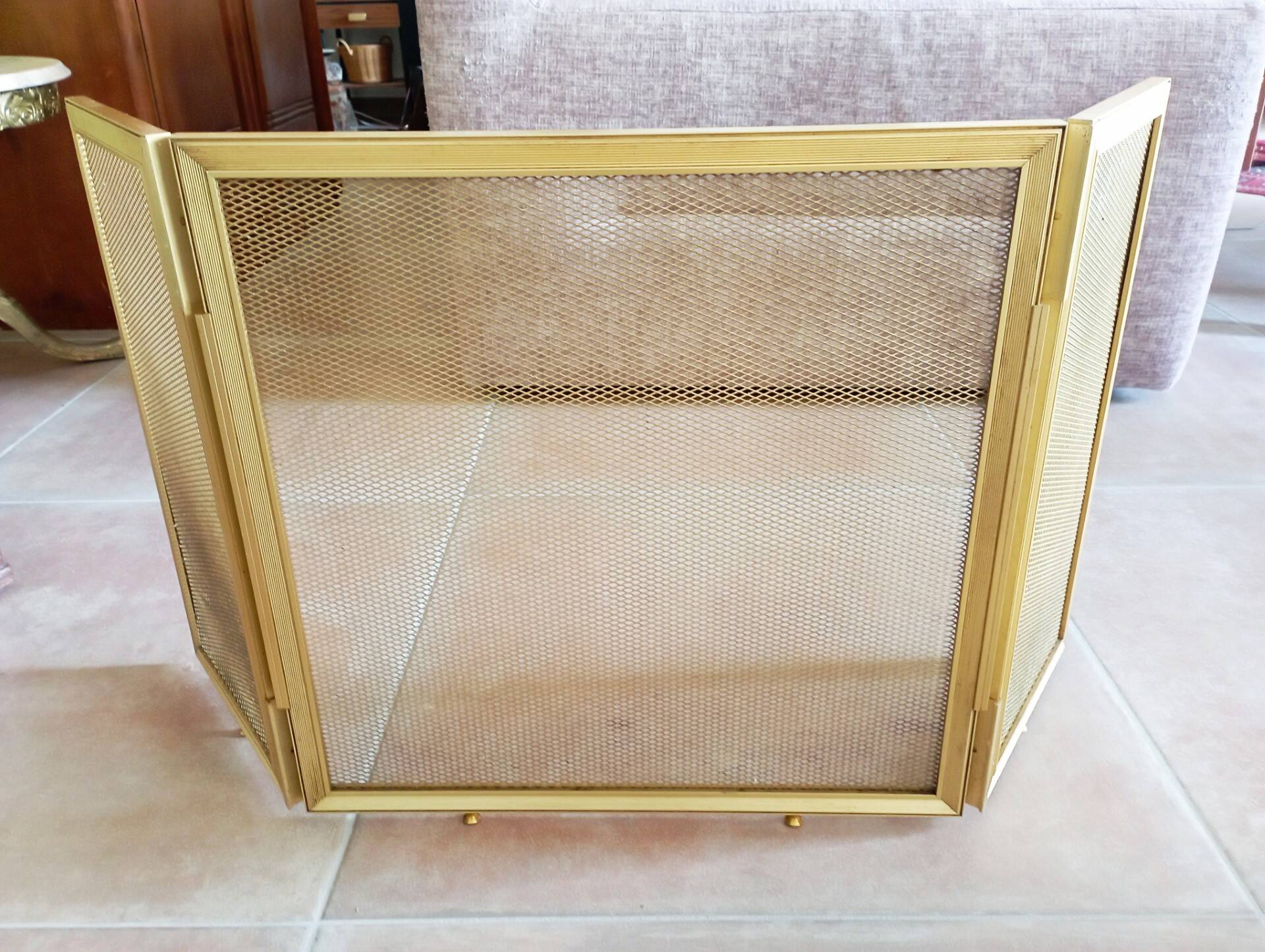 Gold metal fire screen