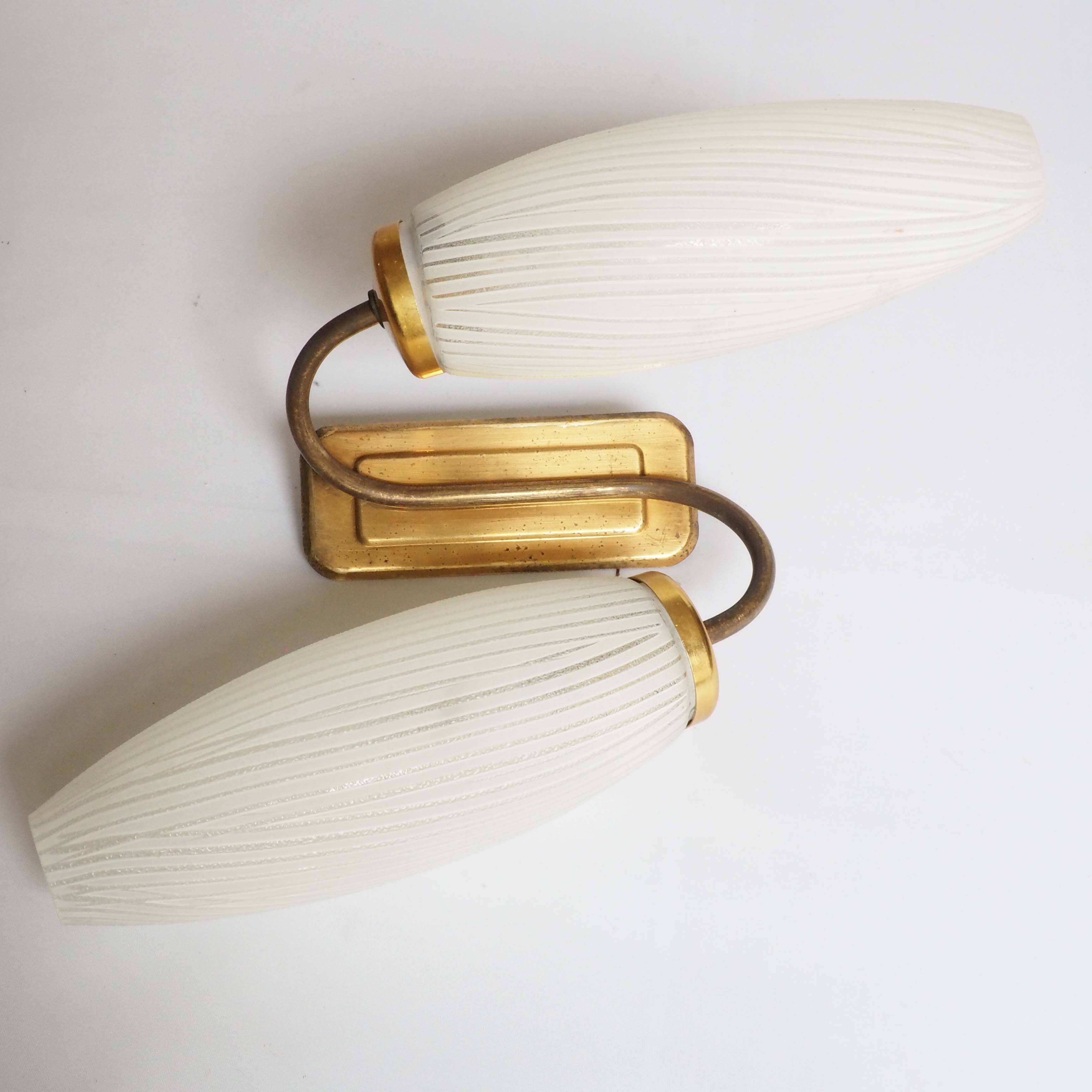 Double flute and brass wall light