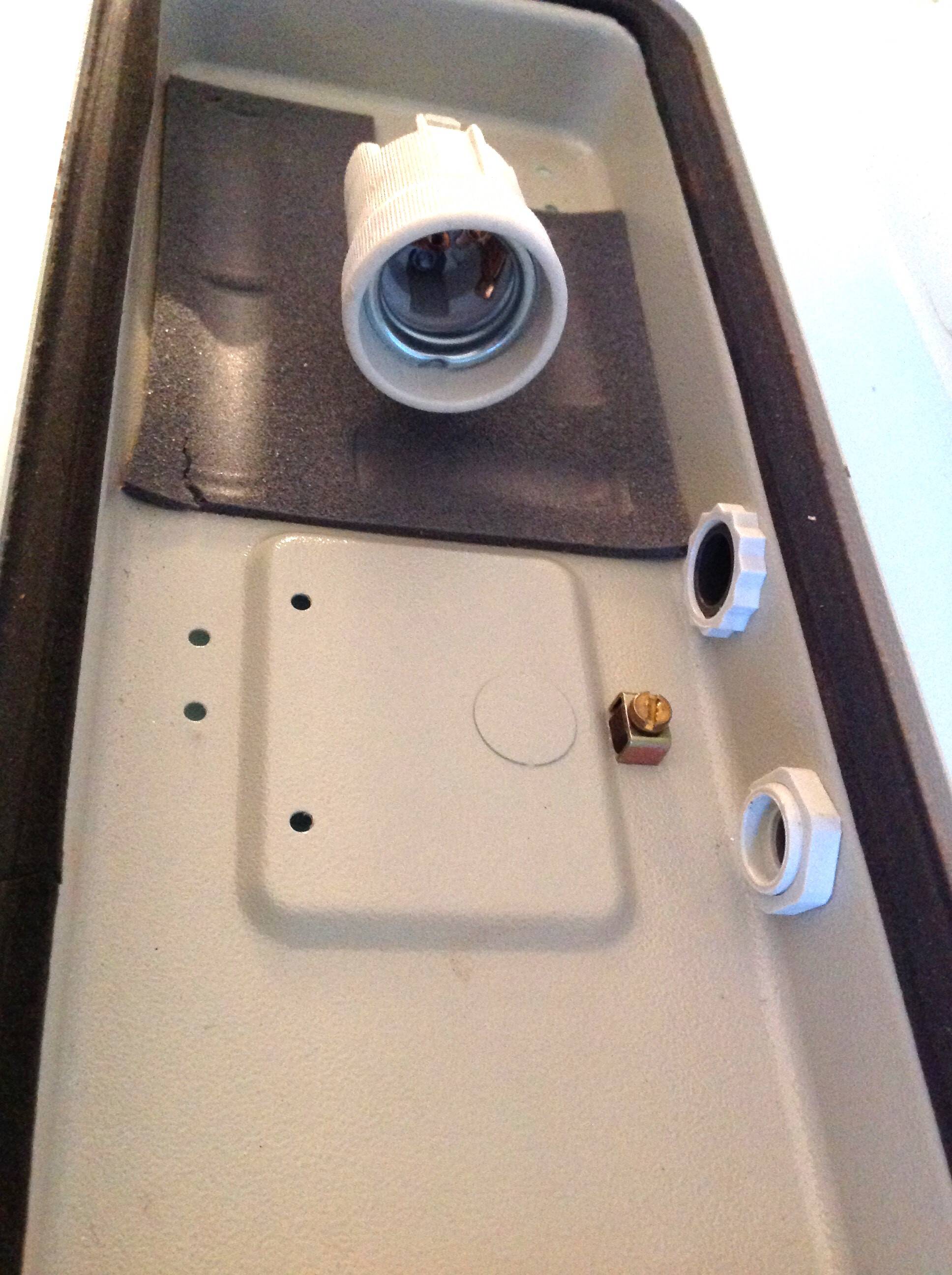 Rectangular porthole wall light in industrial/70s style frosted glass