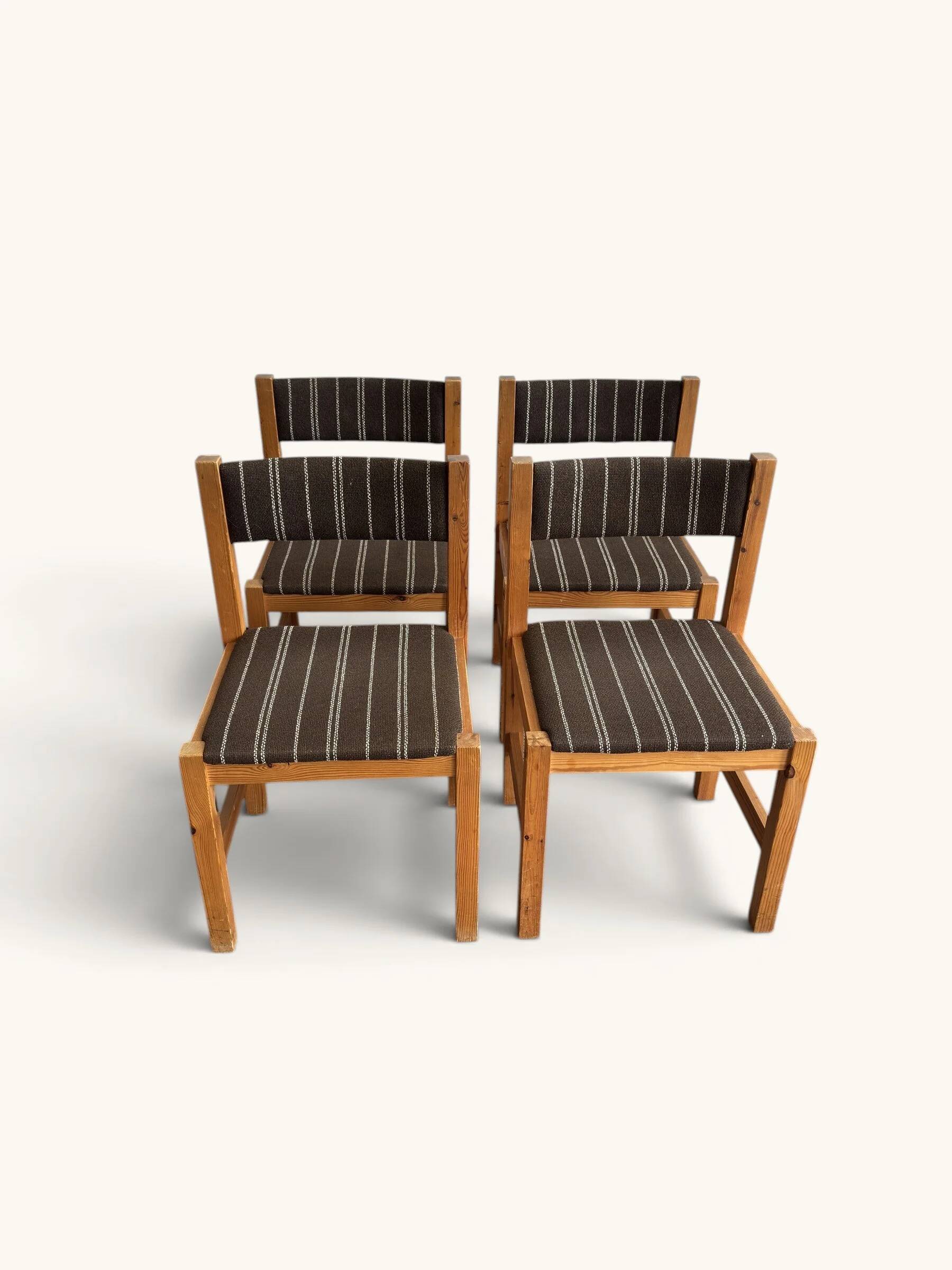 Set of 4 Danish dining chairs with brown striped upholstery.