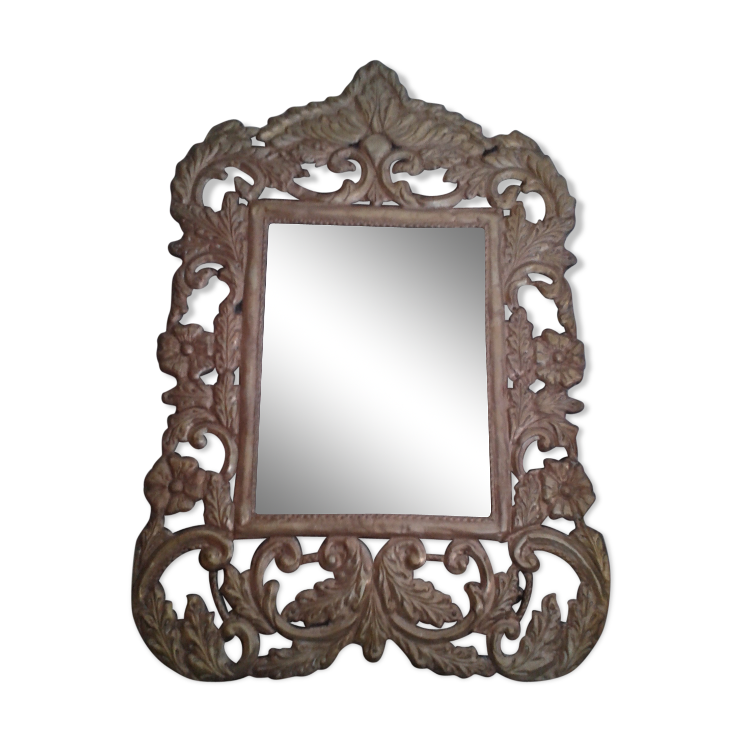 Mirror with embossed metal décor