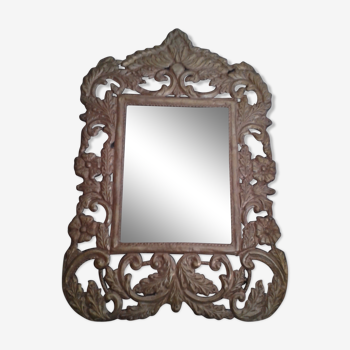 Mirror with embossed metal décor