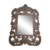 Mirror with embossed metal décor