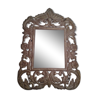 Mirror with embossed metal décor