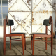 Paire de chaises scandinaves en bois et skaï des années 60