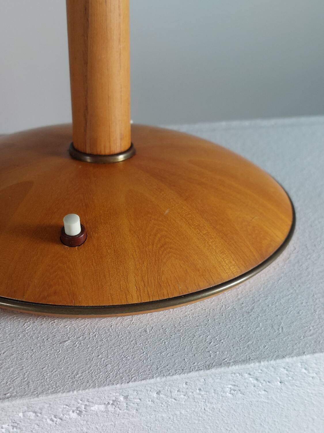 Vintage wooden and brass table lamp by Temde from the 1950s.