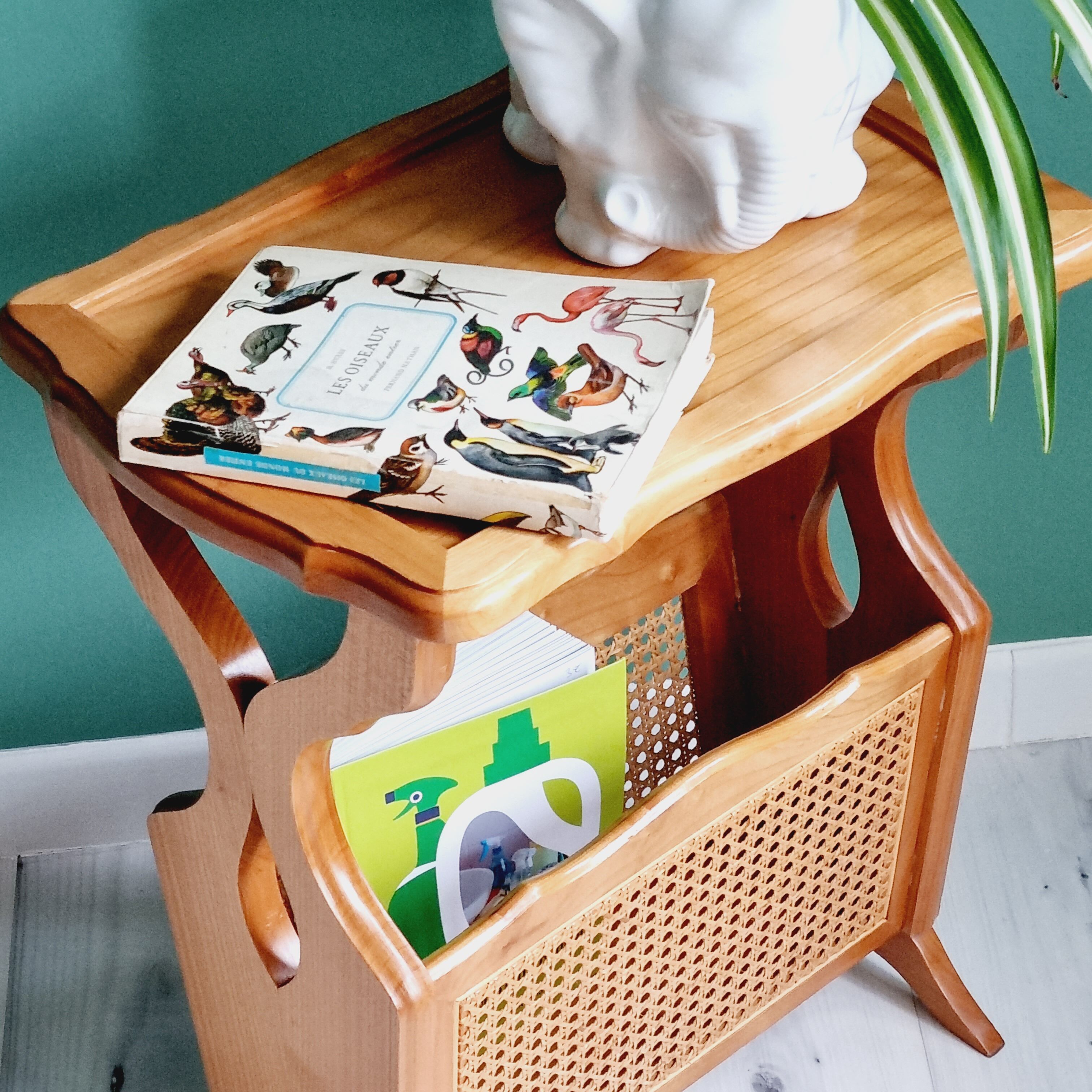 Side table with wooden and cane magazine holder