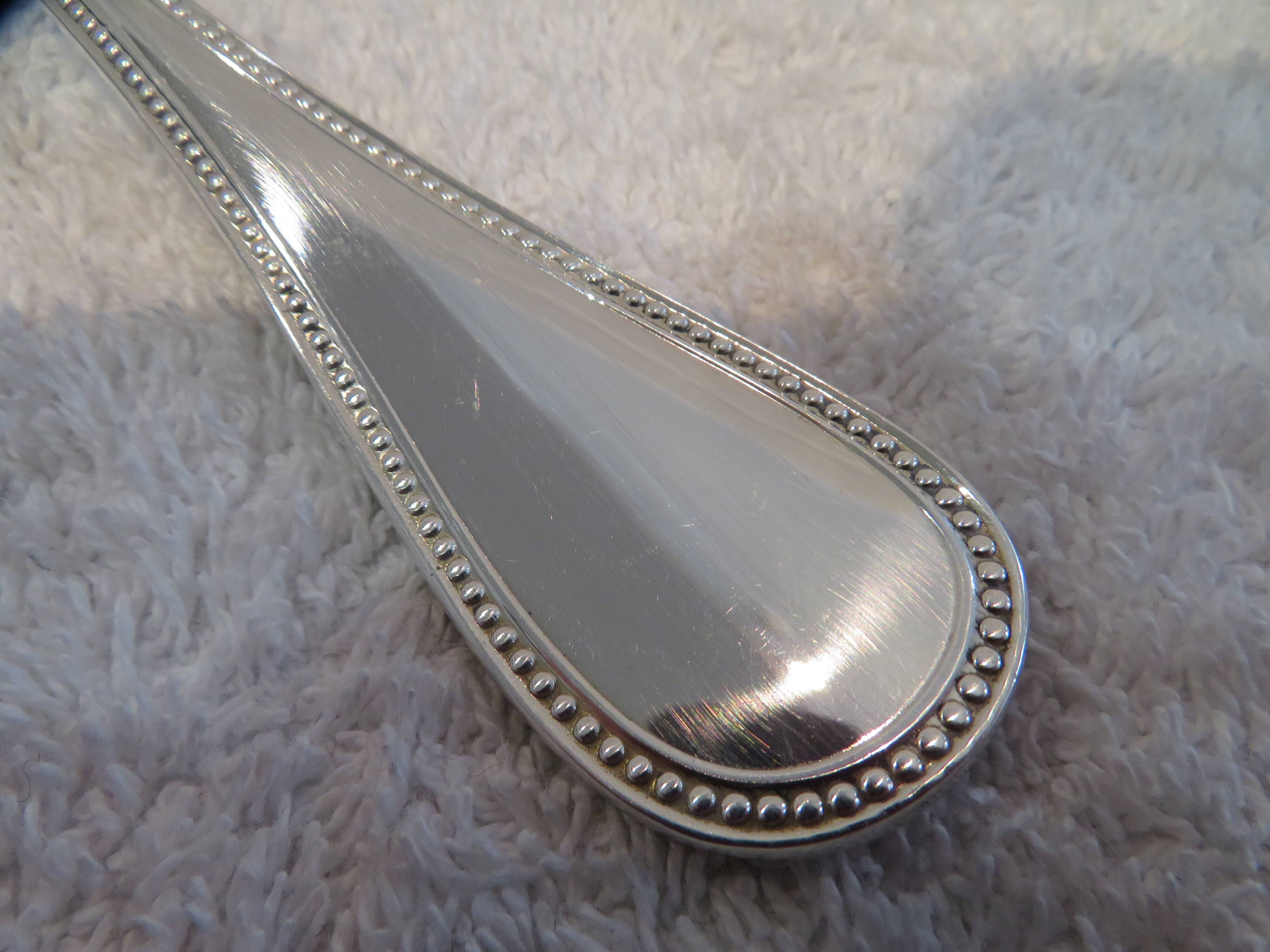 Christofle silver-plated ice cube serving spoon with pearl decoration
