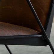 Modernist Dutch lounge chair in enamelled steel and leather from the 1950s.