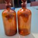 Paire de flacons a pharmacie en verre marron
