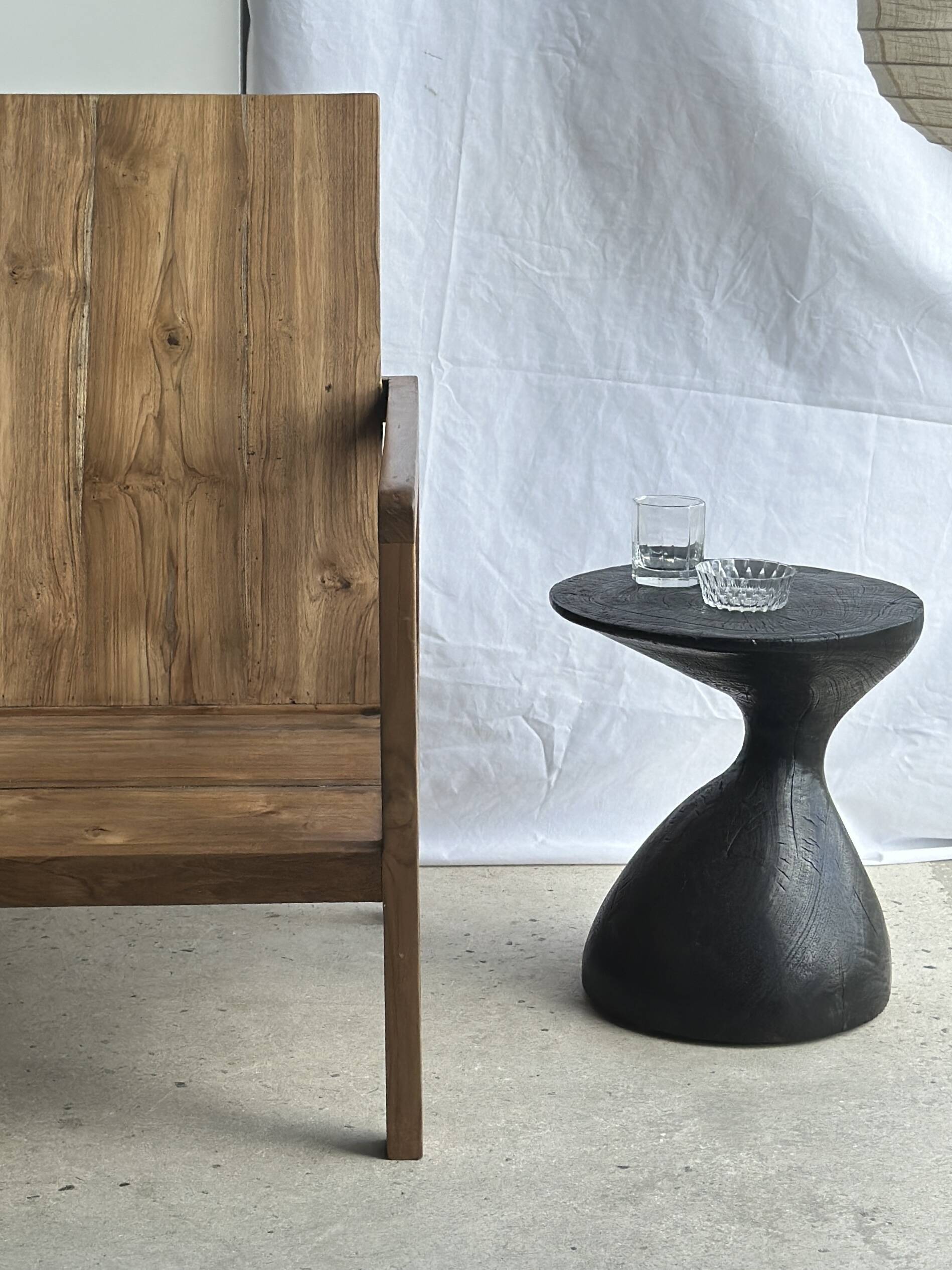 Solid wood (monoxyl) side table, organic shape, black color