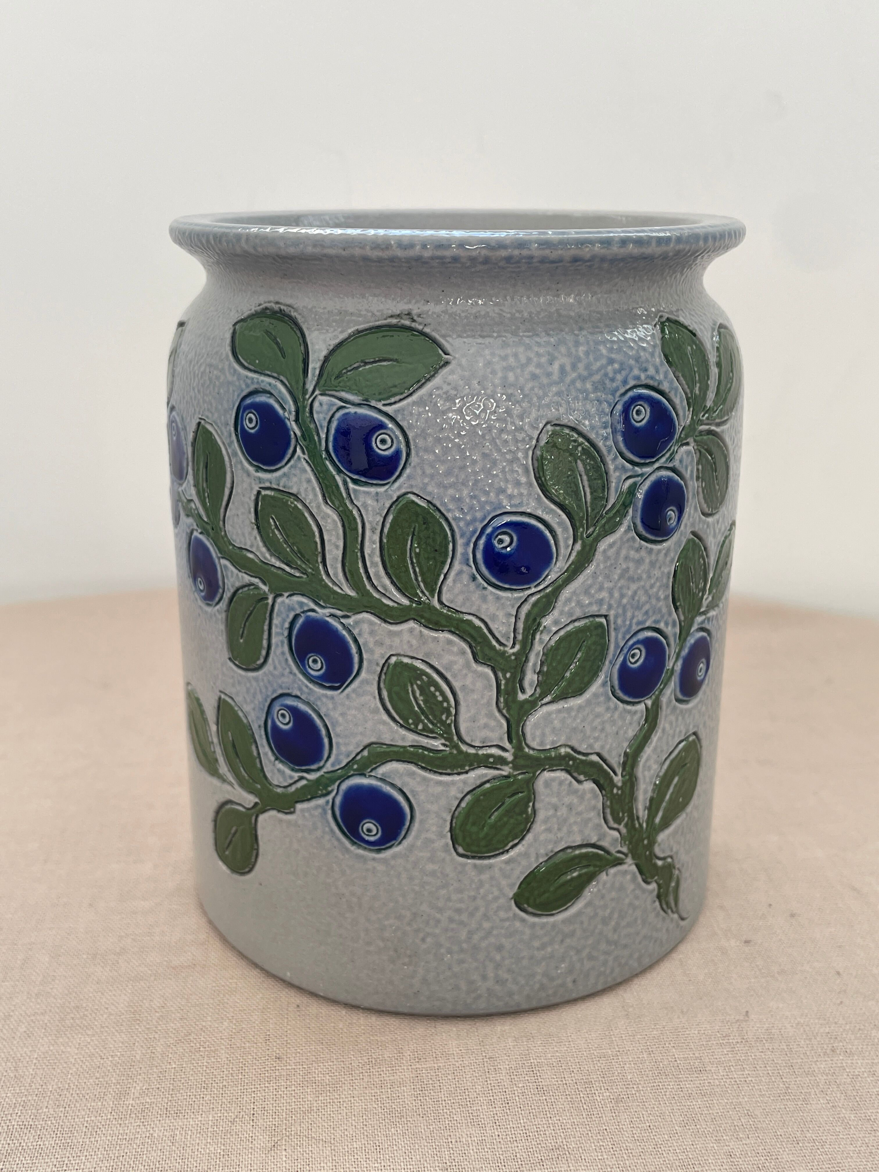 Vintage stoneware pot from Betschdorf signed TA Gilbert with olive decoration.