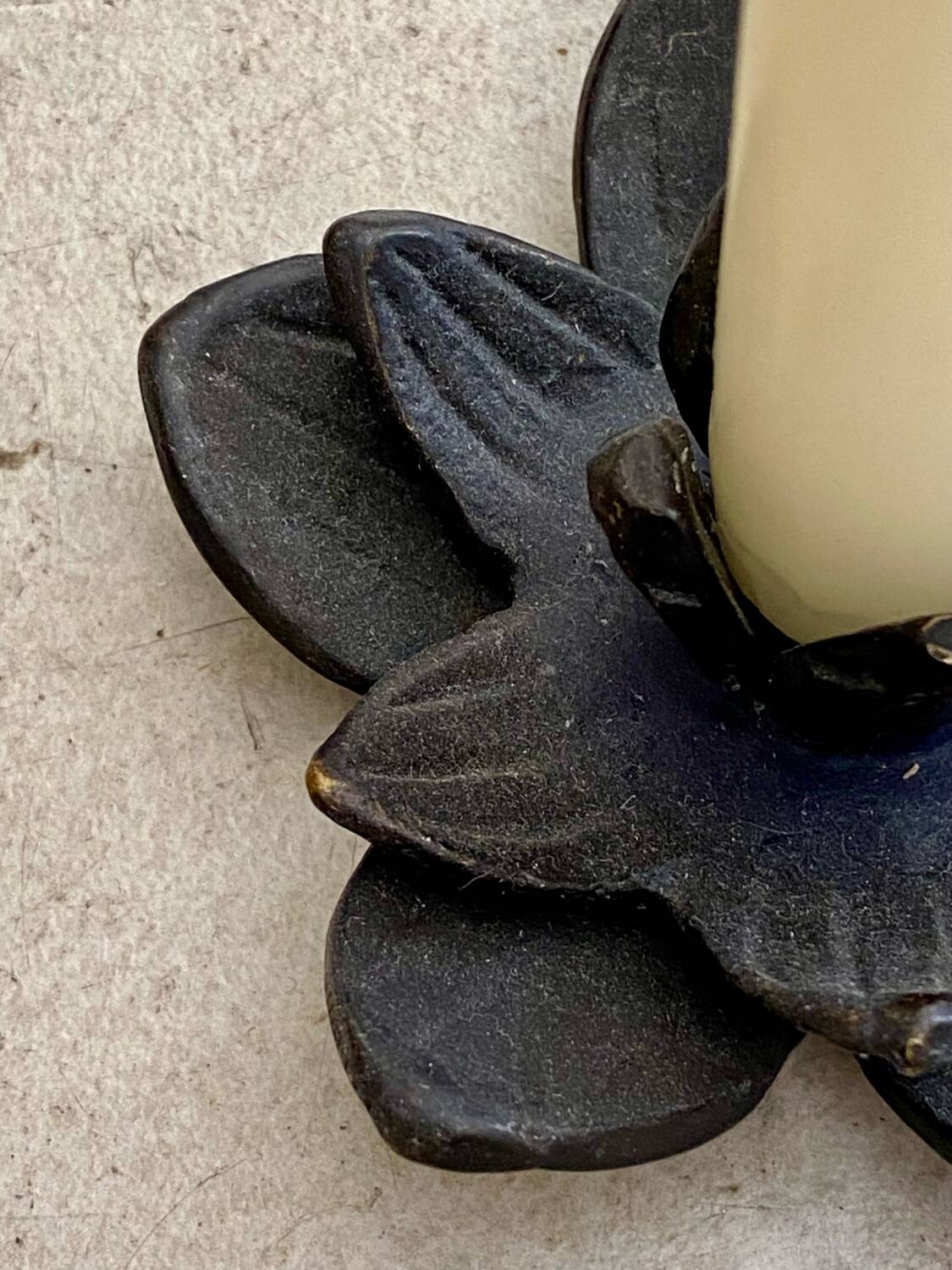 Cast iron candle holder