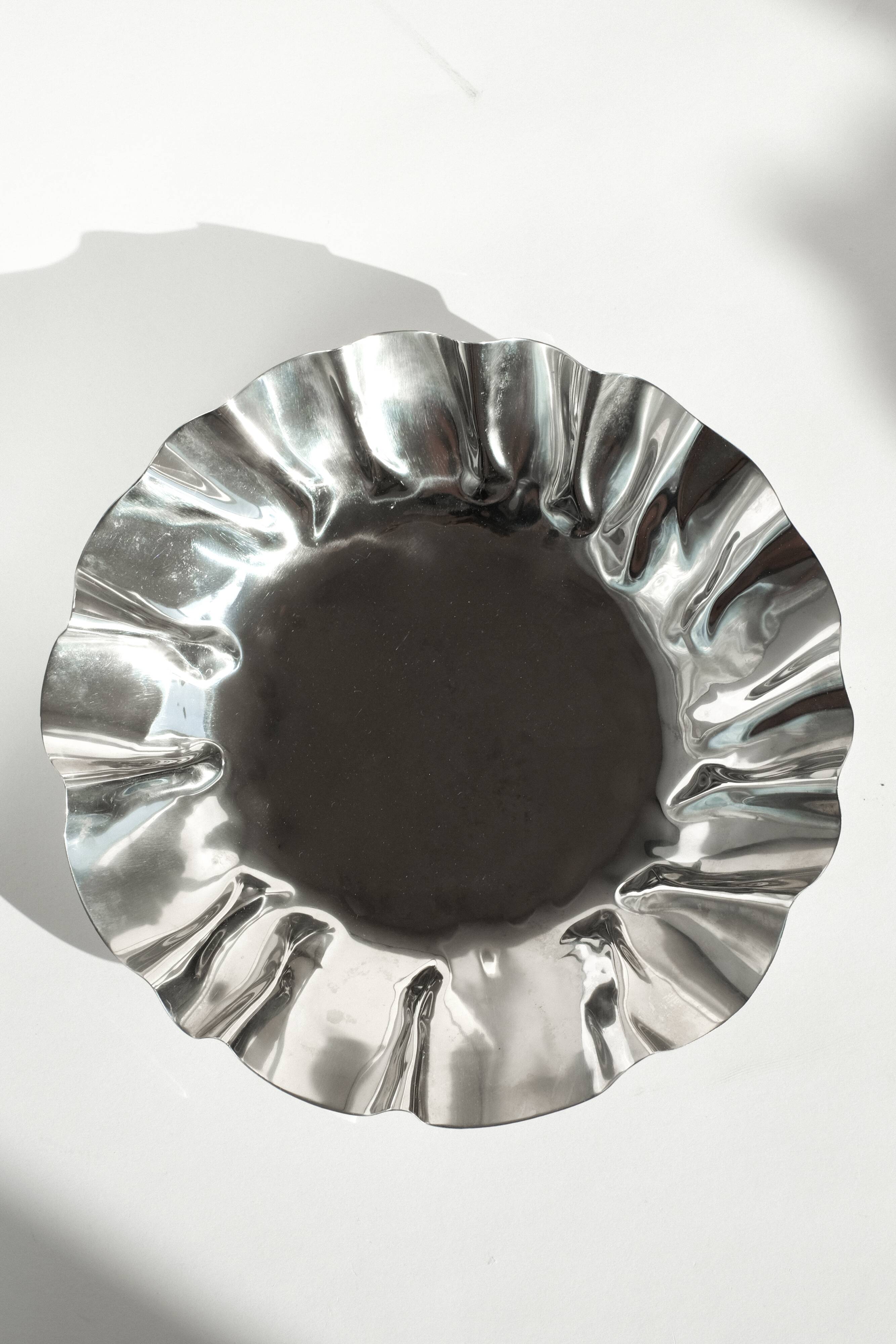Large folded chrome bowl