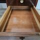 Art Deco executive desk in exotic wood, glass, and brass.