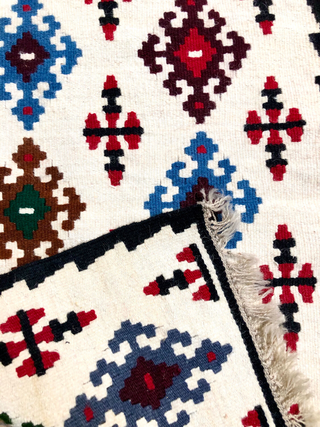 Small ethnic carpet