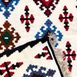 Small ethnic carpet