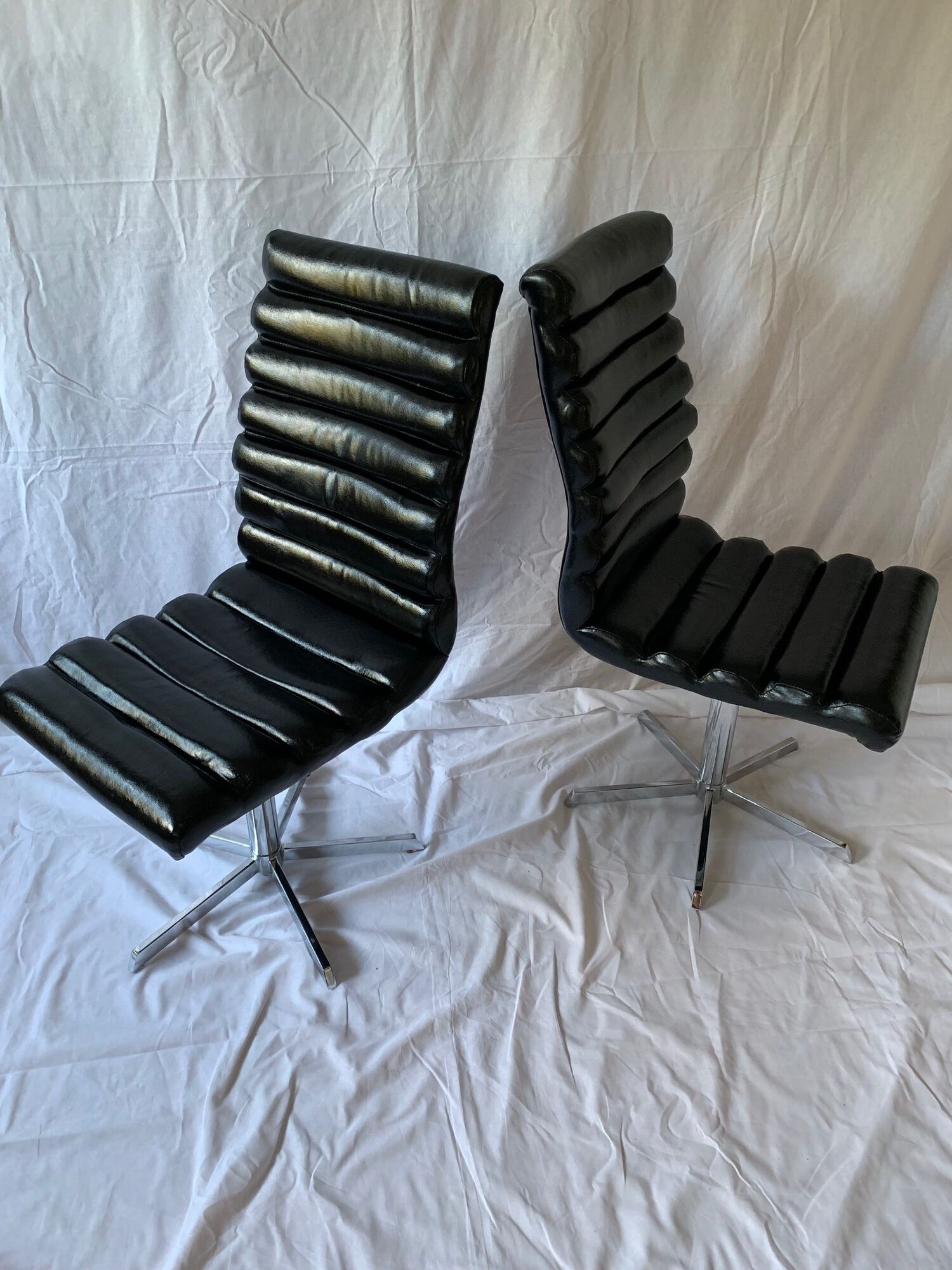 A set of four leather chairs, Italy, 80s
