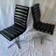 A set of four leather chairs, Italy, 80s