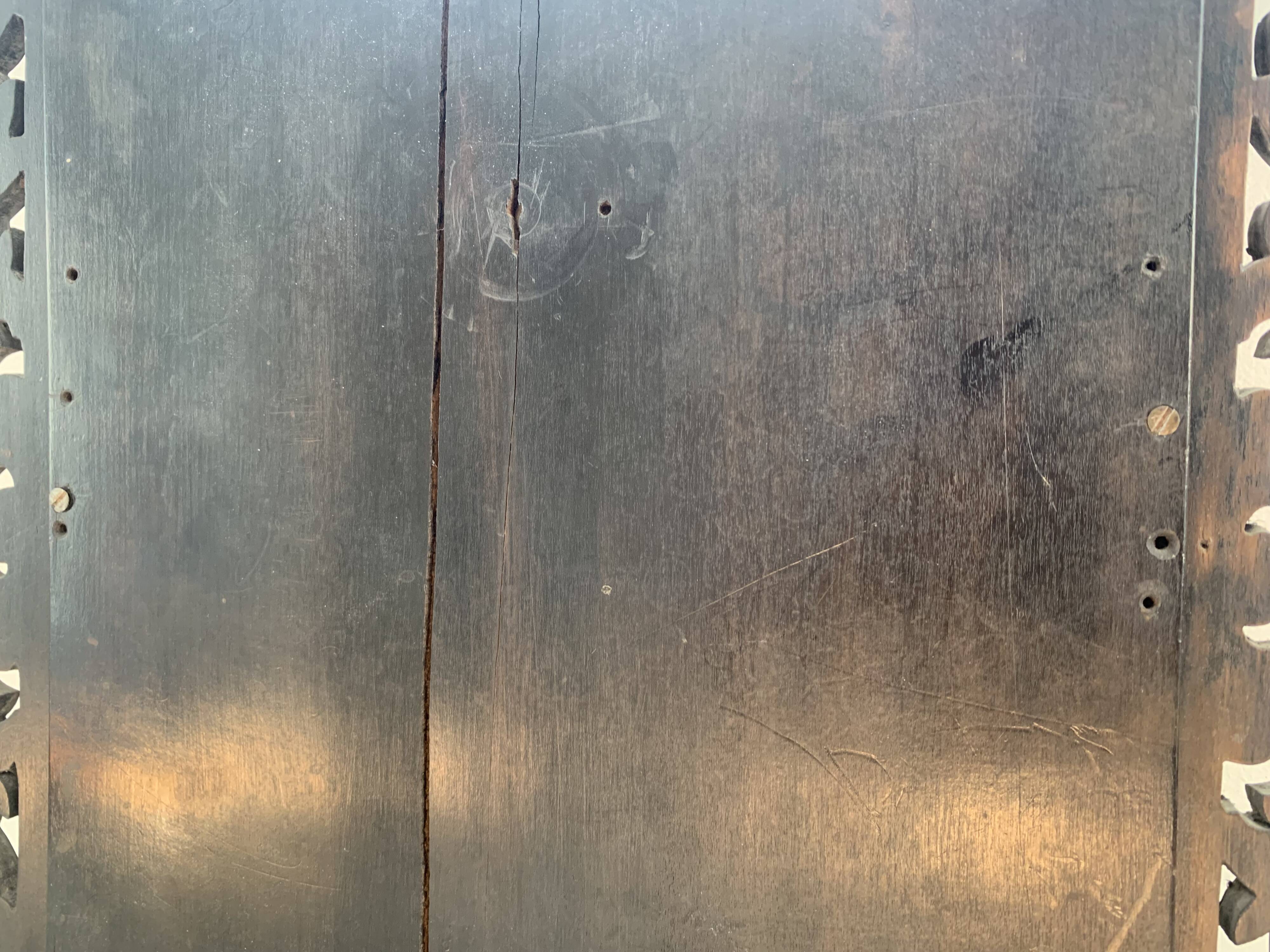 Eventful beveled mirror and openwork period 1900 repelled tin decoration