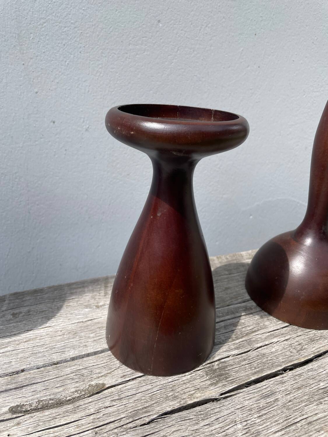 Trio of large turned wooden candlesticks