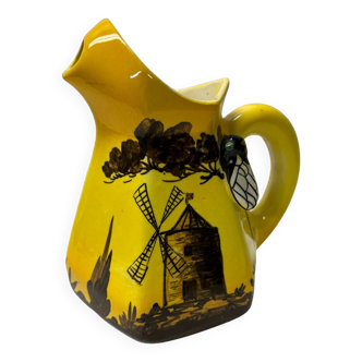 Old carafe pitcher with cicada pattern