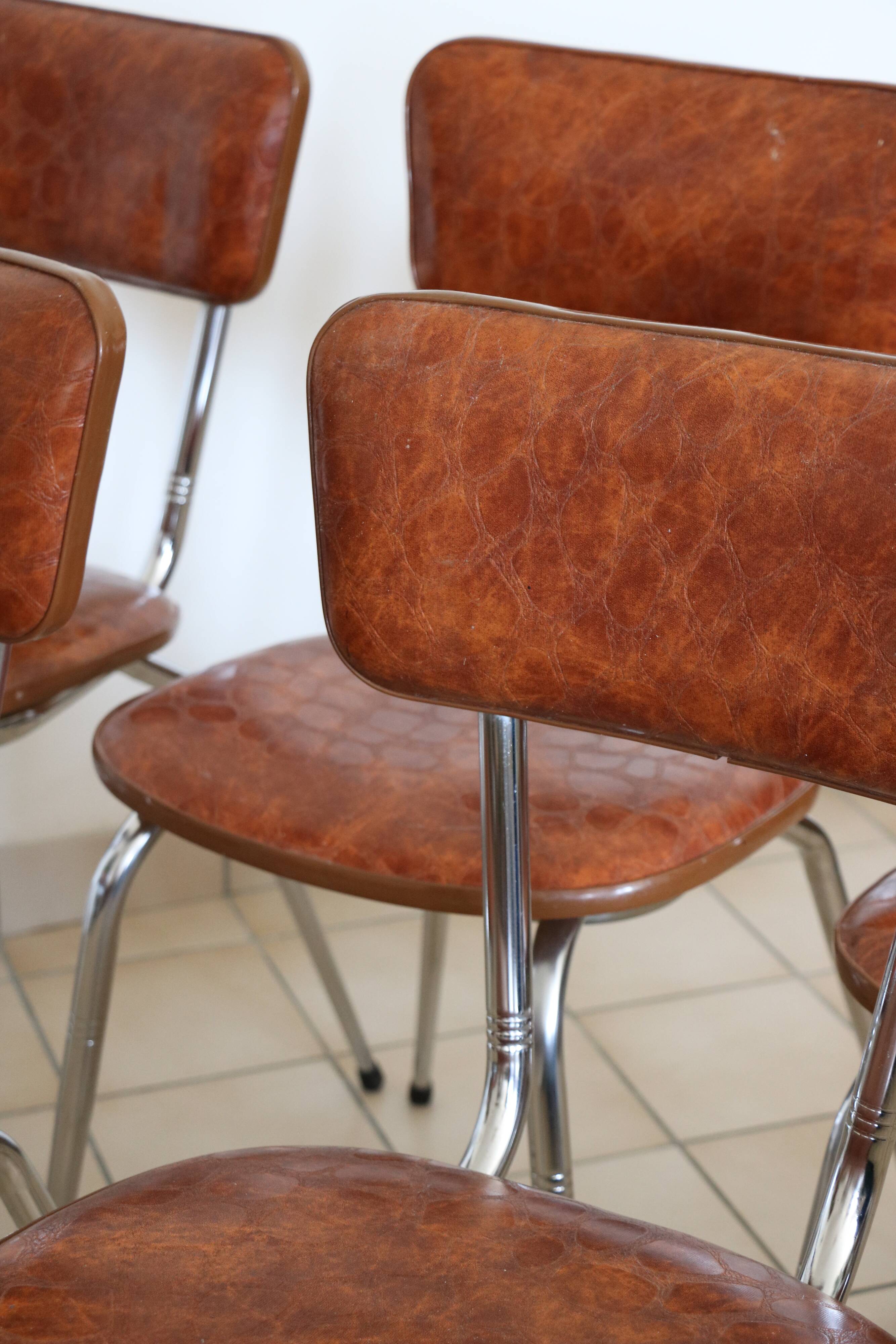 6 brown skai and chrome steel chairs