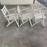 Folding wooden armchairs