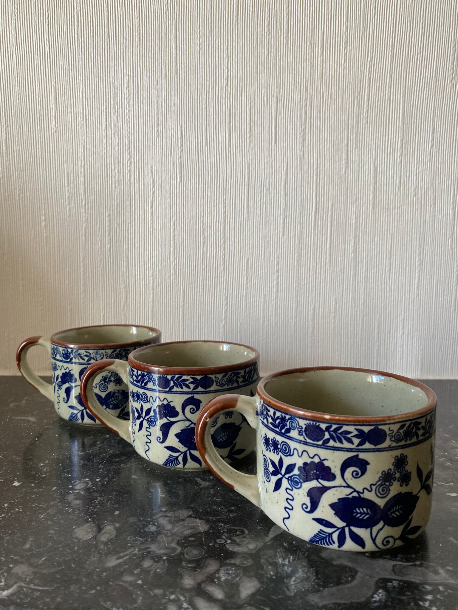 Trio of ceramic coffee cups