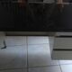Industrial metal desk from the 70s with three drawers and glass top