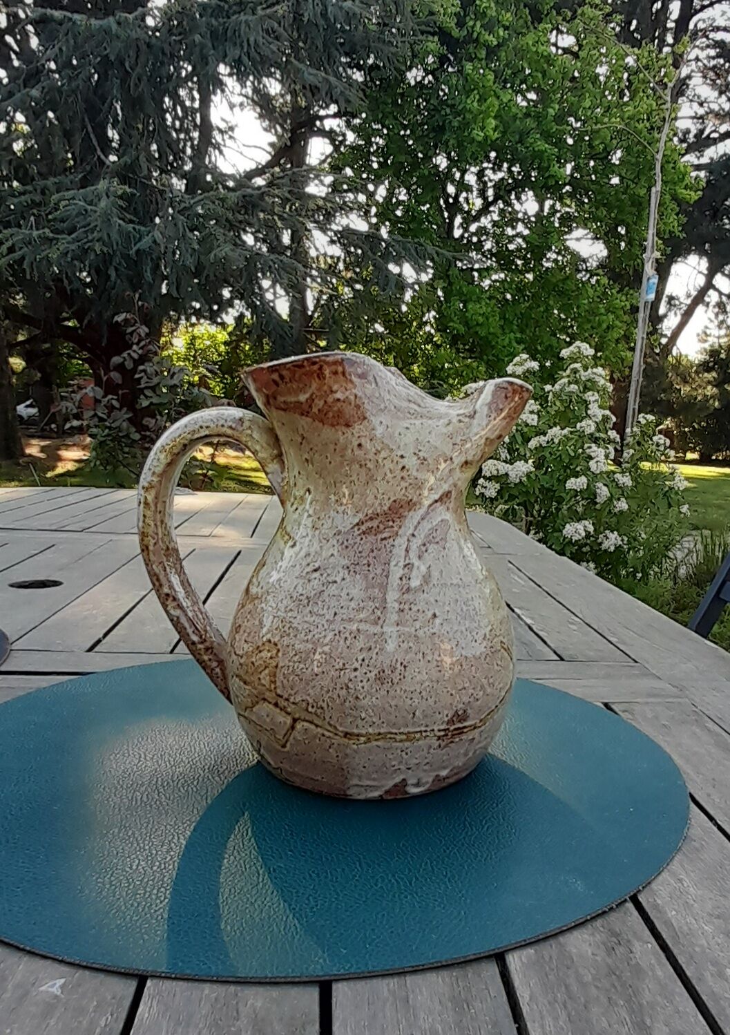 Old cider pitcher in varnished sandstone early 20th century