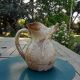 Old cider pitcher in varnished sandstone early 20th century
