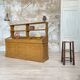 Wooden hardware cabinet painted with wood effect, circa 1940.