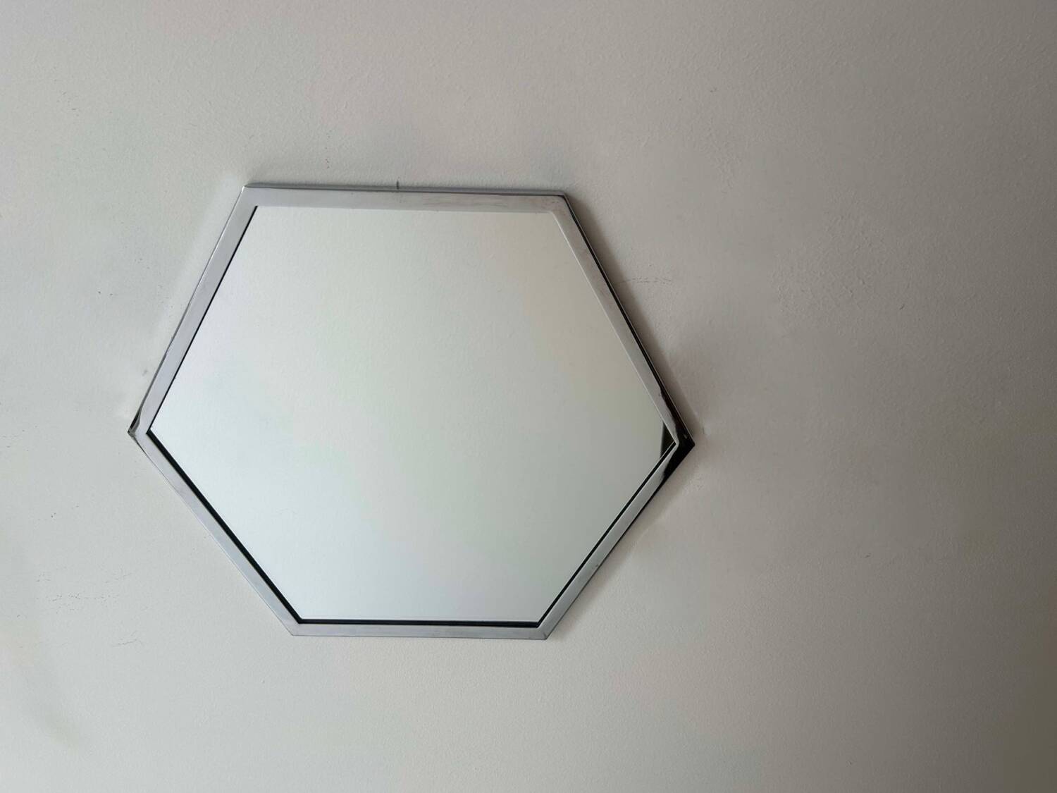 Vintage hexagonal mirror, chromed metal, France 1980