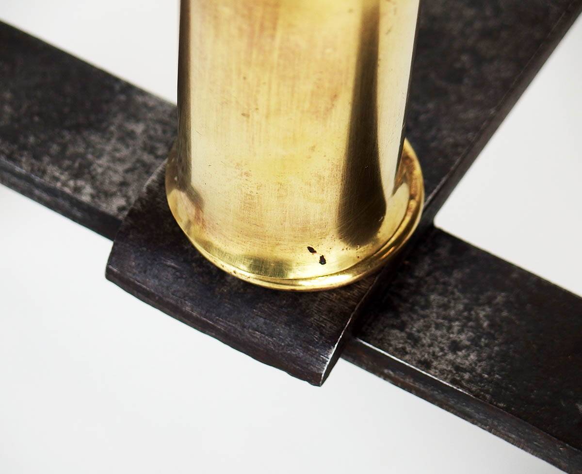 Pair of andirons by Jacques Adnet