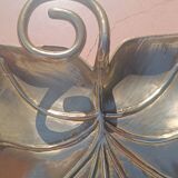 Gilded brass leaf pocket emptier