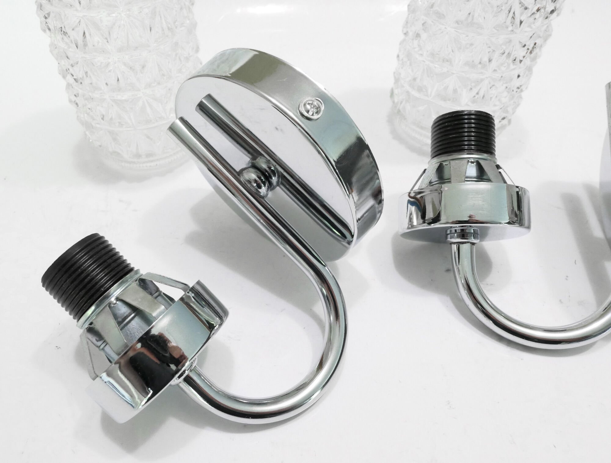 Pair of 1970 chrome metal wall light and molded glass globes.