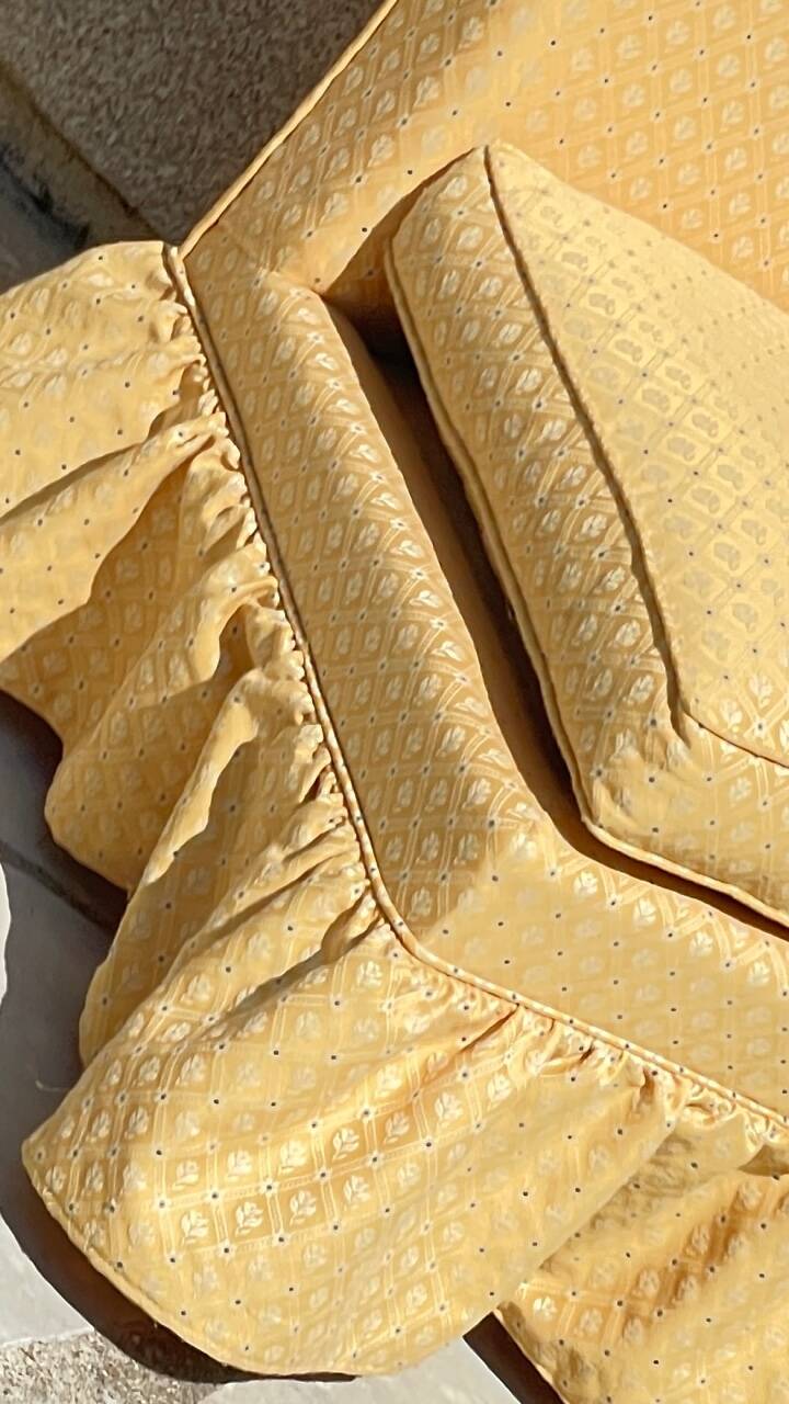 Vintage upholstered fabric toad armchair