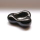 Biomorphic vacuum-pocket cup - black modeled ceramic - 1950's