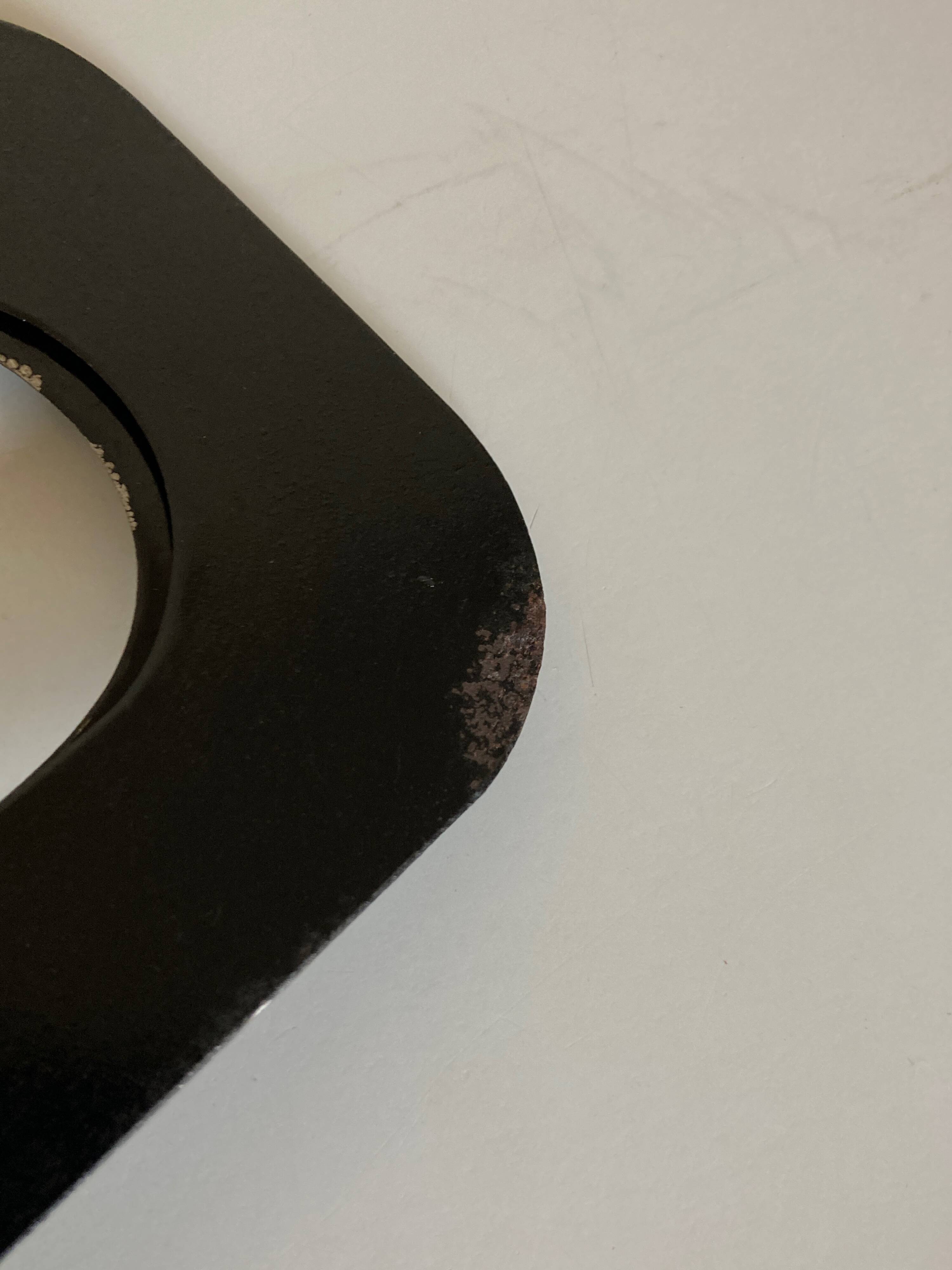 Pair of heavy metal bookends, folded, 1920.