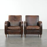 Set of two vintage sheepskin leather design armchairs in a cognac colour