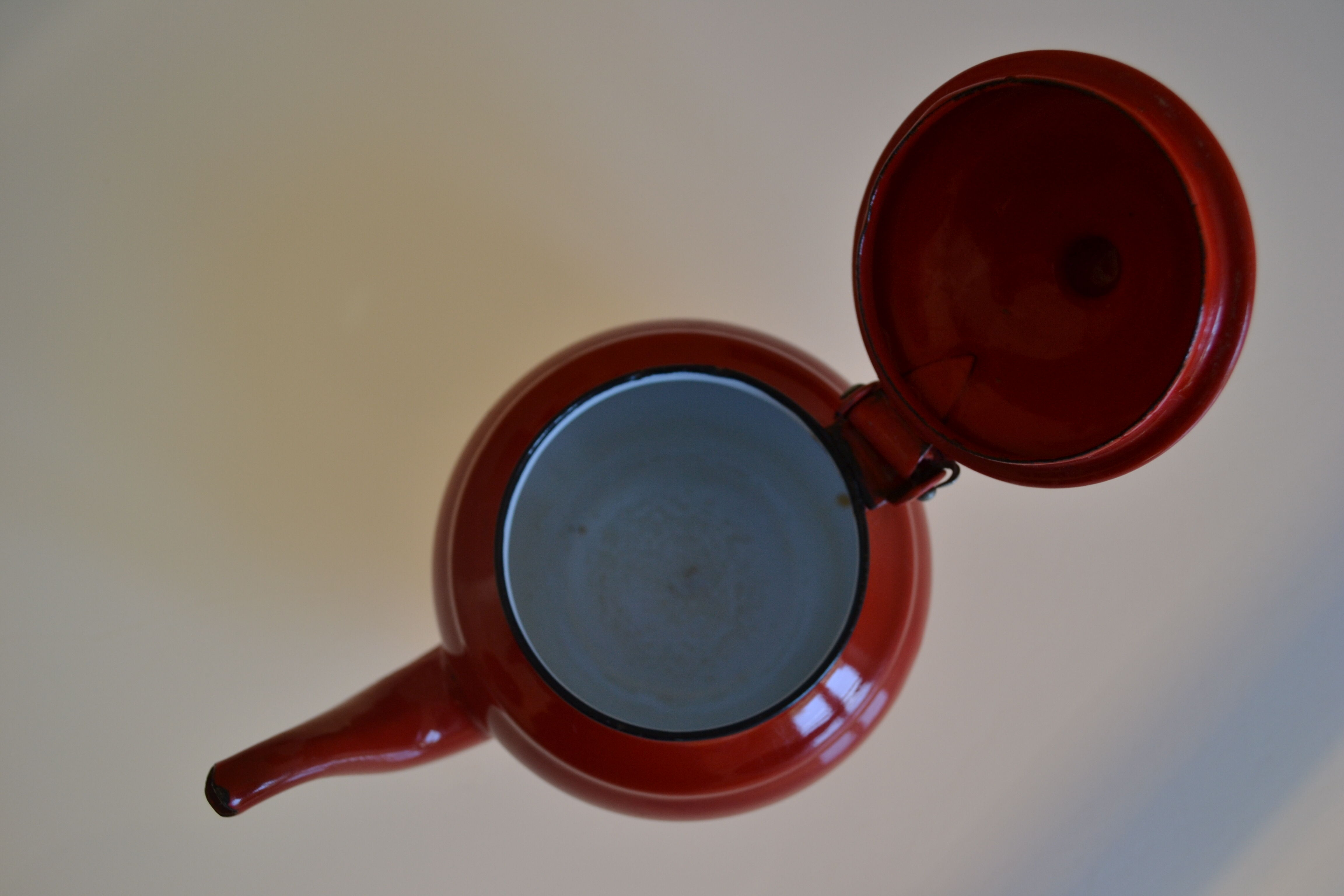 Vintage tea in red and black enamelled sheet