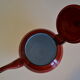 Vintage tea in red and black enamelled sheet