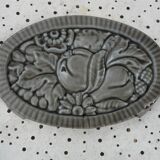 Art Deco period grey enamelled cast iron trivet