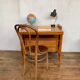 Modernist vintage chest of drawers in light chene has 3 drawers rattan top changing table